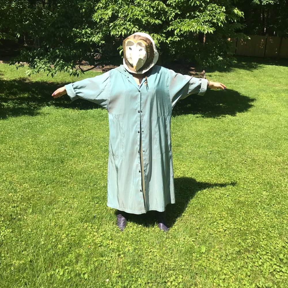 Babette San Francisco turquoise raincoat